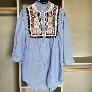 Beautifully embroidered shirt dress.